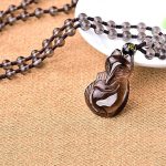 Accessoire chanceux en forme de renard en obsidienne
