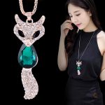 Collier inspiré du renard avec une pierre émeraude