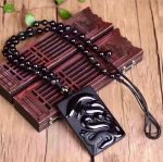 Bijou homme en obsidienne avec motif renard