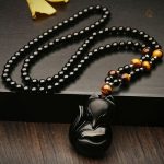 Collier orné de perles et motif de renard chic