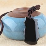 Accessoire en obsidienne, thème renard